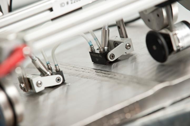 Phoenix ISL TOFD transducer probes mounted on encoded scanner performing automated ultrasonic weld inspection per BS EN ISO 13588