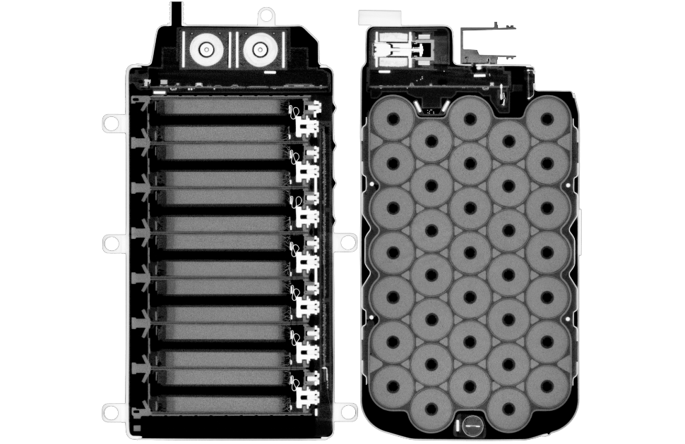 2D slices of the battery module showing components with varying density with one CT scan 2D slices of the battery module showing components with varying density with one CT scan