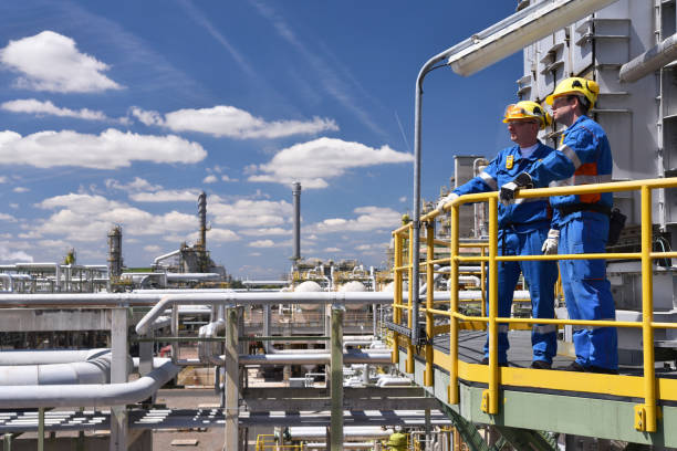 Engineers Inspecting Work at Industry Engineers Inspecting Work at Industry