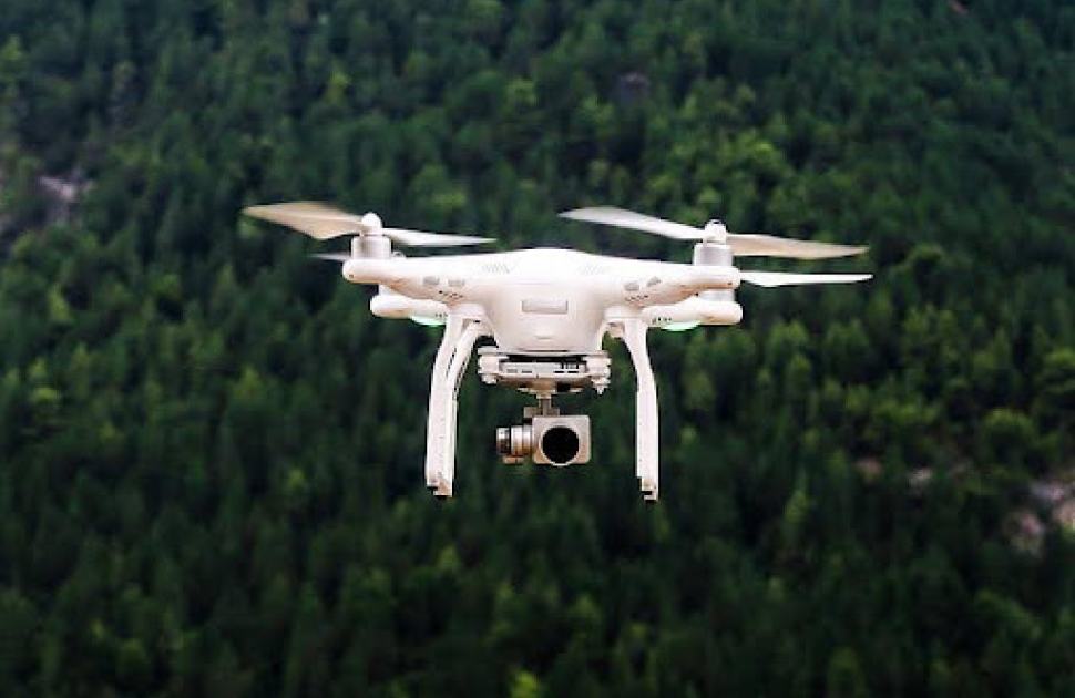 A drone equipped with a camera in operation
