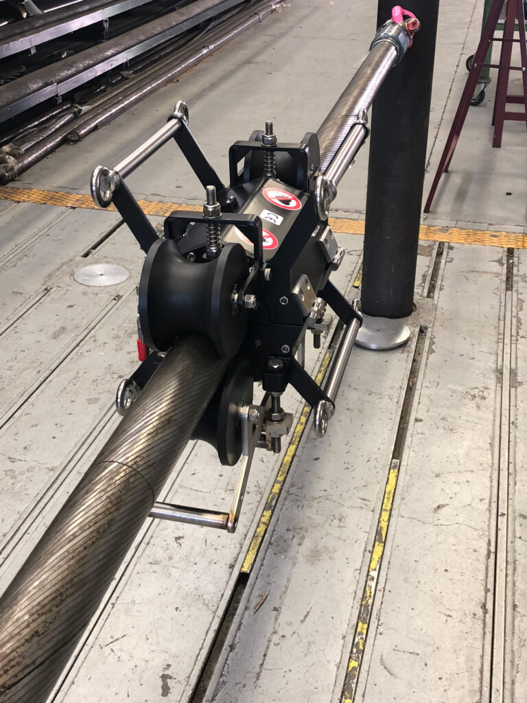 Wire Rope Scanner Automated MFL Inspection System Compliant with ISO 4309:2017 and ASTM E1571 Automated wire rope scanner clamped on industrial wire rope for magnetic flux leakage NDT inspection per ISO 4309:2017