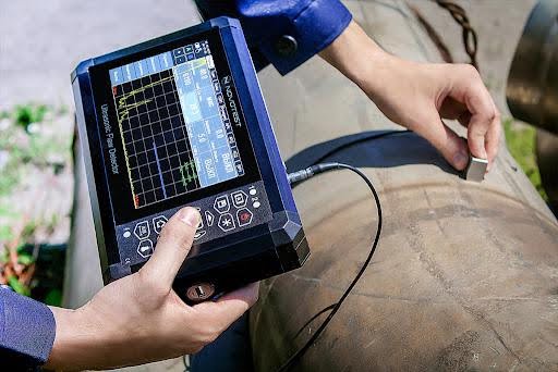 An Ultrasonic Testing Machine under operation